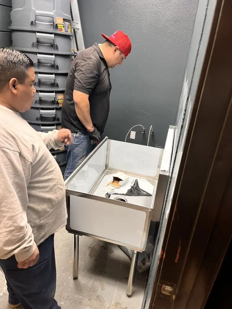 Commercial plumbing and sink installation in Denton